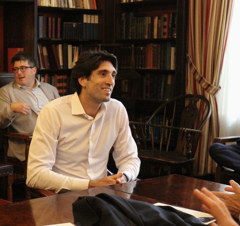 A speaker in discussion at a recent Atlas gathering